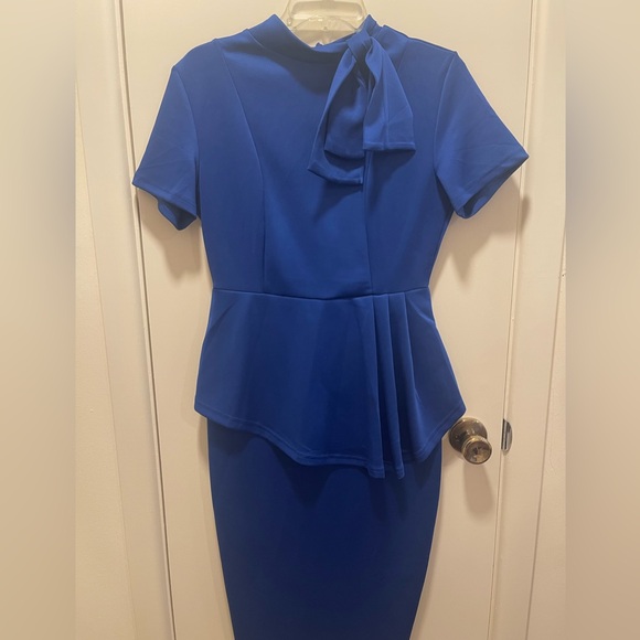 Dresses & Skirts - Elegant Blue Peplum Dress with Bow Detail